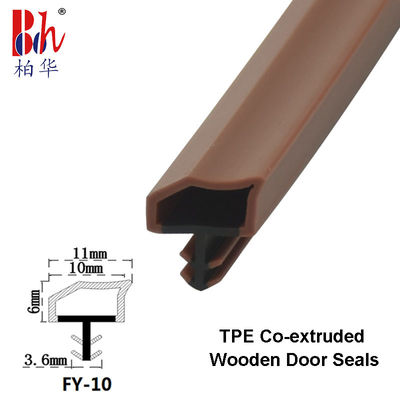 La TPE Co-sacó el sello de goma de la puerta de madera que las tiras Weatherstrips color de madera de la teca