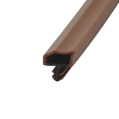 La TPE Co-sacó el sello de goma de la puerta de madera que las tiras Weatherstrips color de madera de la teca